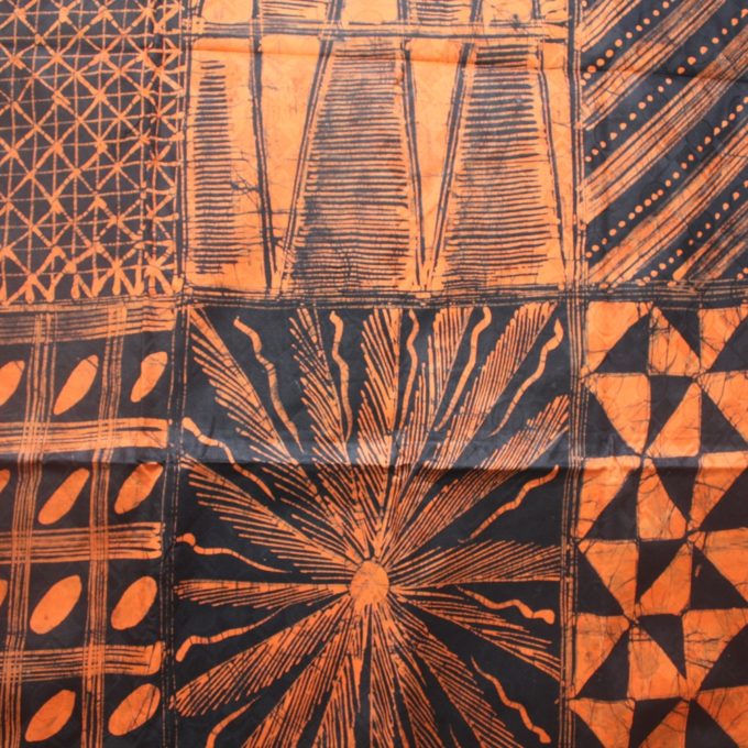 Orange and black batik fabric