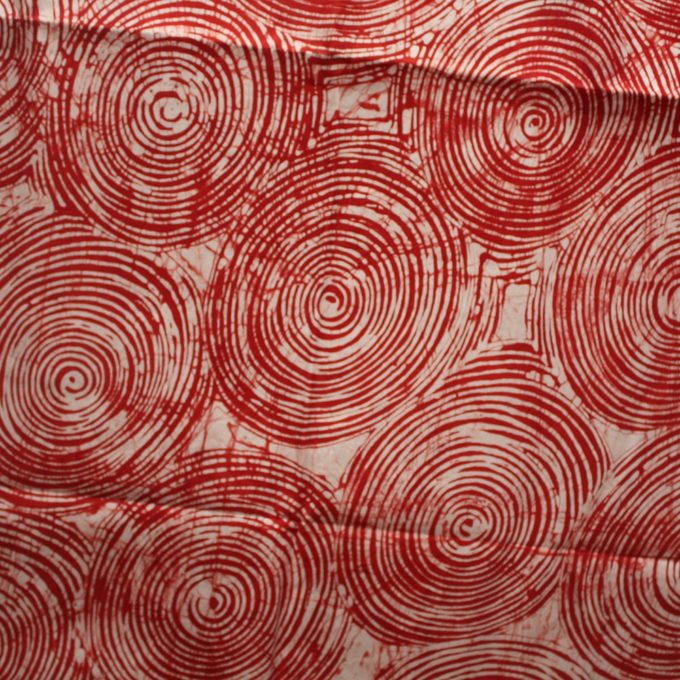 Red circles batik fabric from Urbanstax online fabric store