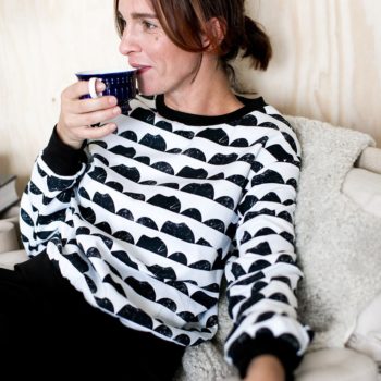 model in printed black and white Assembly Line High cuff sweater