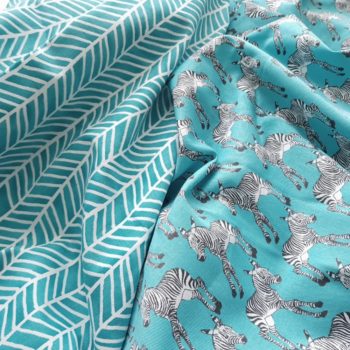 Turquoise and white chevron and zebra print fabrics